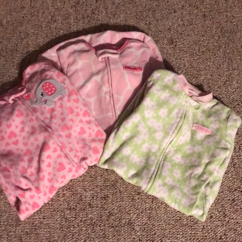 3 Carter’s sleep sacks OS and 2 are 0-9 months